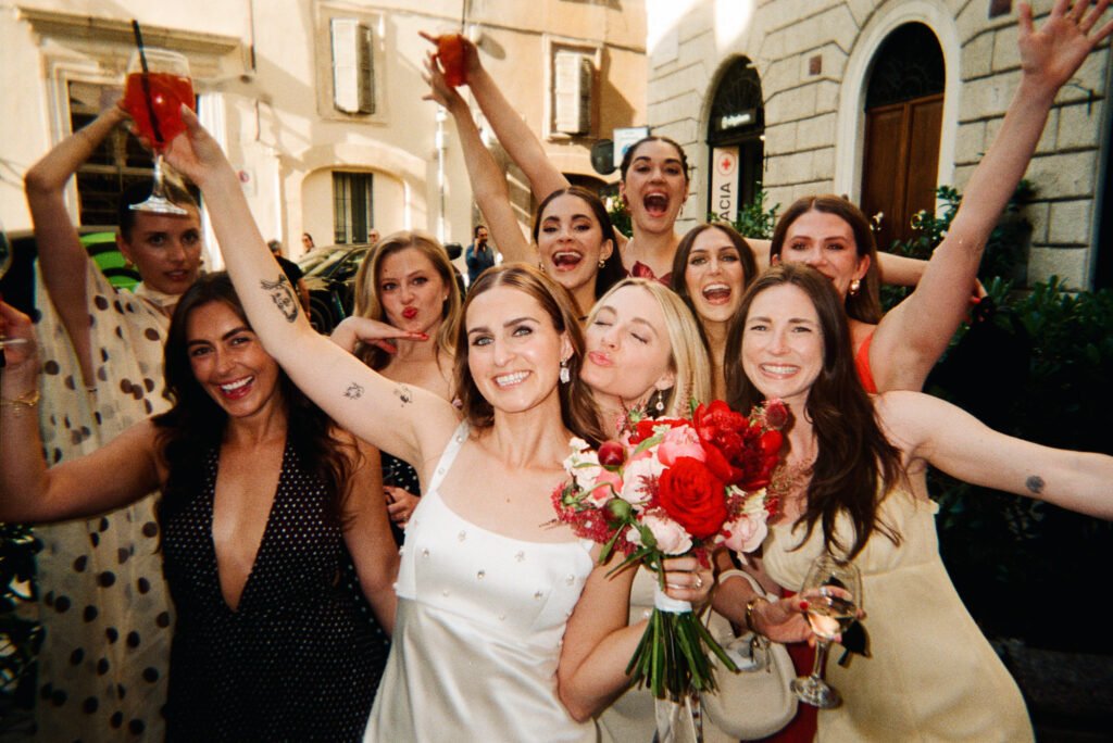 Bride celebrating with friends during a Rome wedding, photographed on 35mm film by a film wedding photographer in Rome